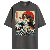 A dark gray oversized t-shirt featuring a large graphic print of a beagle dog riding a wave in a traditional Japanese ukiyo-e style with a red sun and Japanese text.